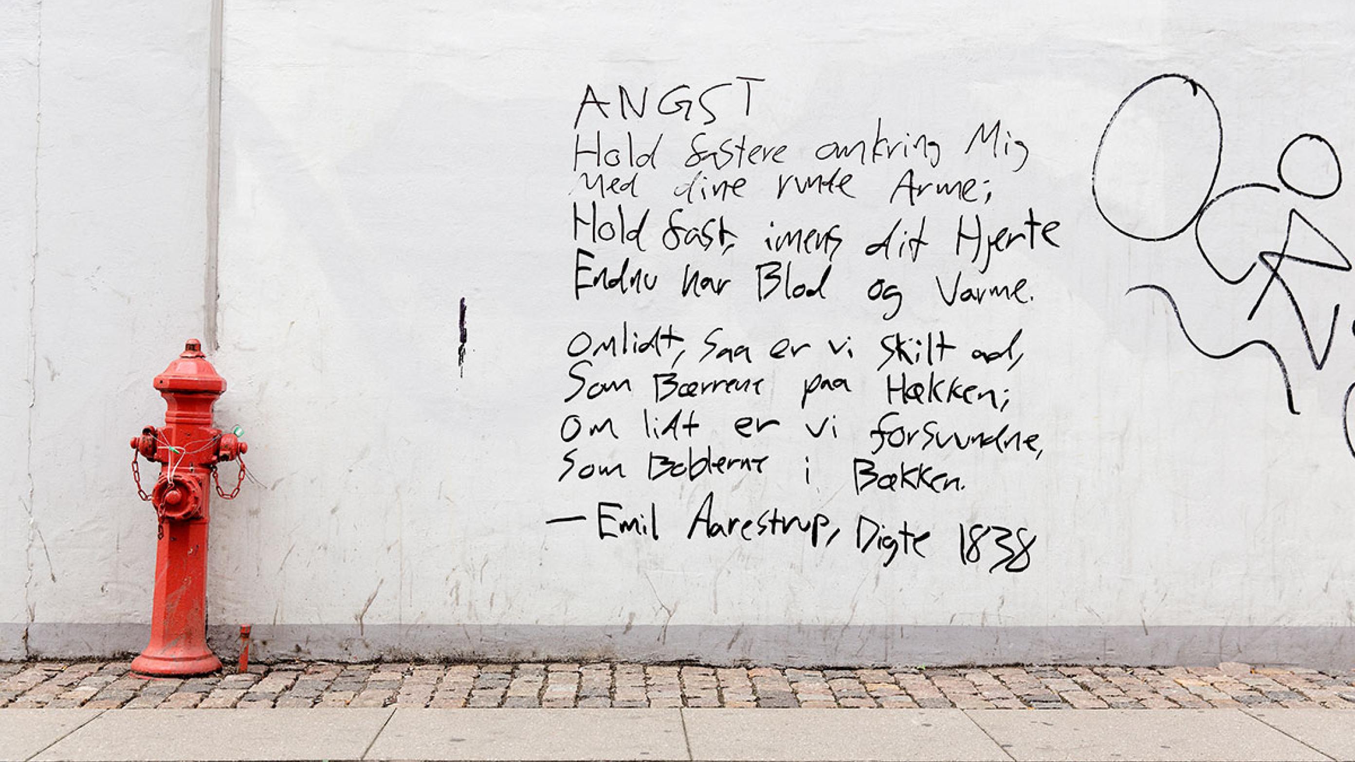Digt af Emil Aarestrup skrevet som graffiti på en mur i København.