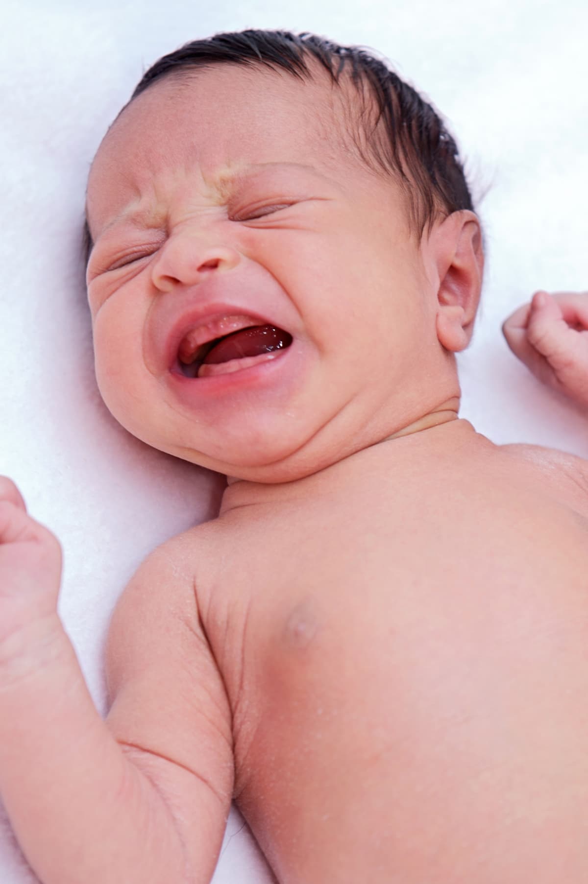 Barn med gastroøsofageal  refluks-sygdom Foto: Colourbox