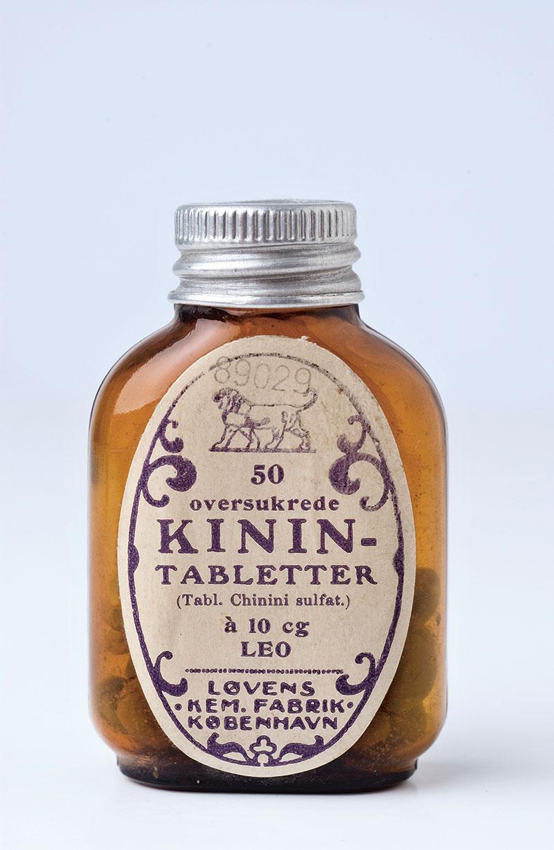 Glas til kinintabletter ca. 1918. Kinin virker febernedsættende og indgik i standardbehandlingen af spansk syge (Dansk Farmacihistorisk Fond). 